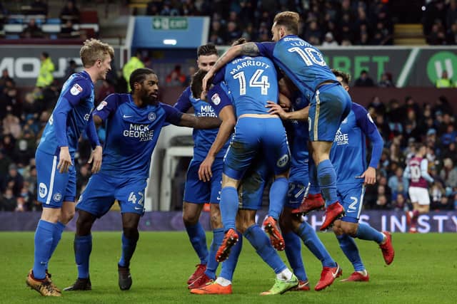 Posh celebrate a goal in their 3-1 win at Aston Villa in a 2018 FA Cup tie. Photo: Joe Dent/theposh.com.