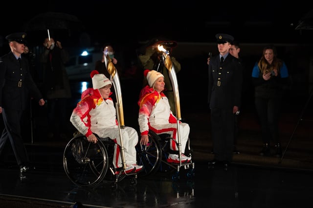 Two paralympic medalists were tasked with lighting the beacon.