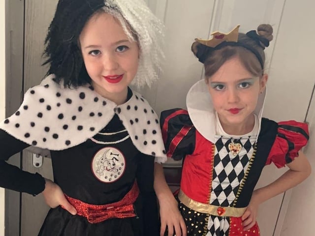 Nevaeh, aged nine, was excited to wear her Cruella costume today after being unable to for the last two years becasue of the pandemic. Courtney, aged eight, was equally as excited to dress as the queen of hearts.