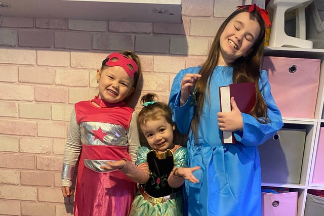 Lacey-Louse, aged five, dressed as Super Girl and Demi-Leigh, eight, as Matilda, who attend Highlees Primary School, with younger sister Millie-Mai, two, dressed as Anna who goes to Young Generations Pre School.