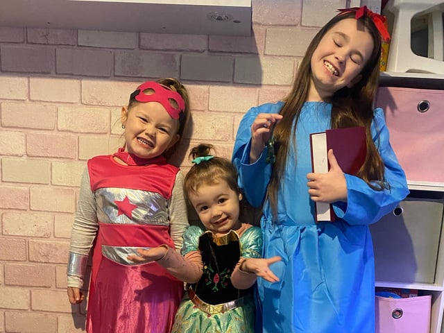 Lacey-Louse, aged five, dressed as Super Girl and Demi-Leigh, eight, as Matilda, who attend Highlees Primary School, with younger sister Millie-Mai, two, dressed as Anna who goes to Young Generations Pre School.