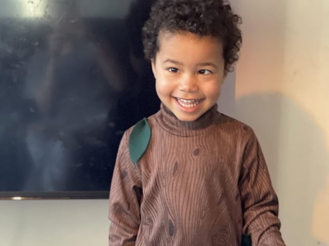 Raheem Buchan, aged two, happy to be dressed up as the Stick Man