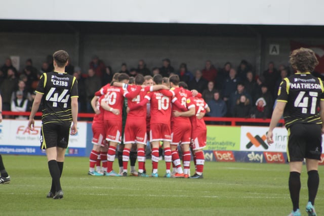 The huddle. Crawley Town v Scunthorpe United. Picture by Cory Pickford SUS-220503-184058004