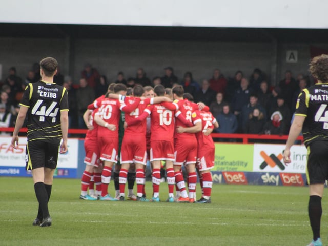 The huddle. Crawley Town v Scunthorpe United. Picture by Cory Pickford SUS-220503-184058004