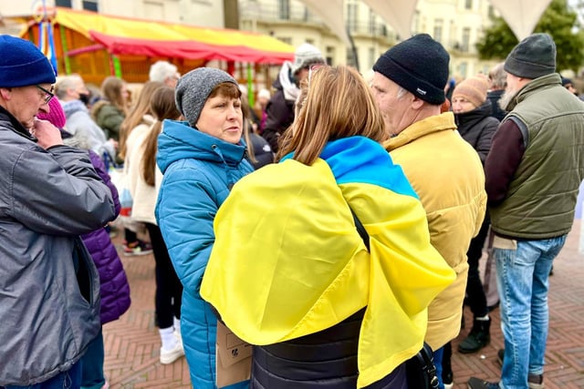 More than 100 people turned up to the protest in Worthing, with many bringing yellow flowers, Ukraine flags and home-made signs 'demanding an end to the war'. Speakers included veteran peace activists and anti-racism campaigners. Photo: @ThisWorthing