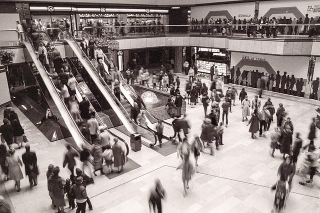 Shoppers in the Queensgate Shopping Centre.