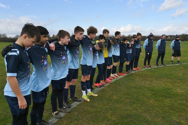 Gunthorpe Harriers Under 14s hold a minute's silence for Kyran Reading.