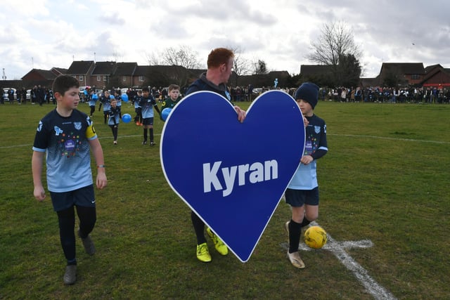 The Under 11's team with their memorial heart.