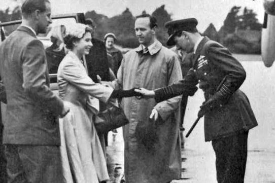 Johnny Kent welcoming the Queen and Duke of Edinburgh to RAF Tangmere in 1955