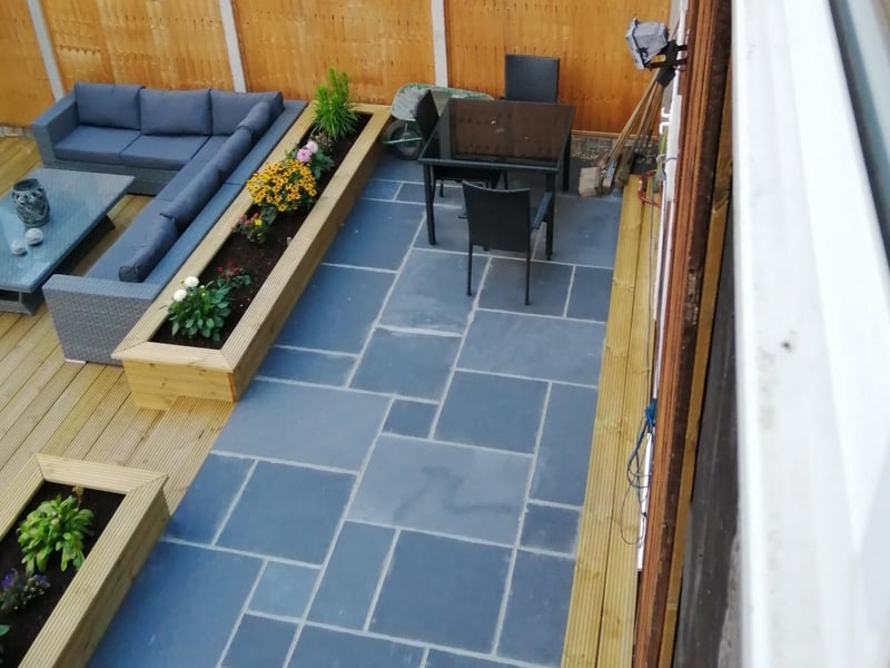 The new paved patio area.