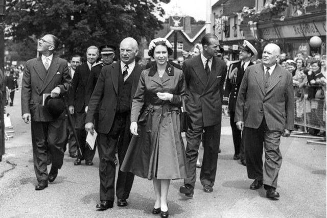 Prince Philip with the Queen at the opening of Queens Square, Crawley, in 1958. 