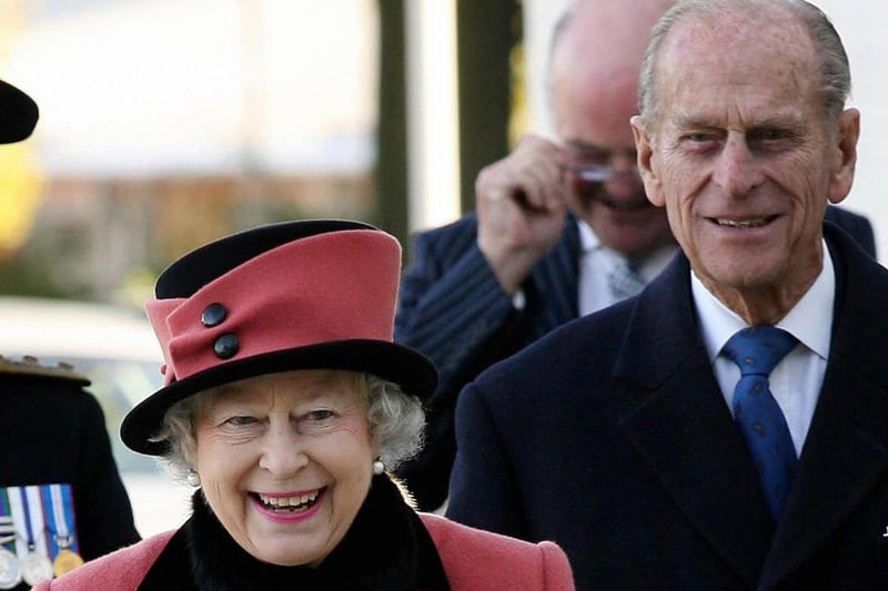 Queen Elizabeth II  and Prince Phillip visit the Thomas Bennett Community College in Crawley, to commemorate the town's 60th anniversary. (Photo credit GARETH FULLER/AFP via Getty Images) SUS-210904-130546001