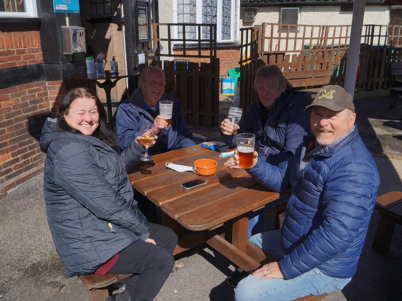 Cheers! Some of the first customers at the Aston Arms EMN-211204-133338001