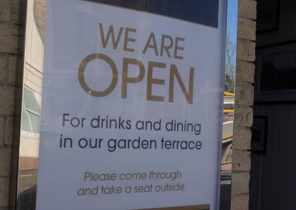 Pubs, bars and restaurants are open for business - but only serving outside EMN-211204-133402001