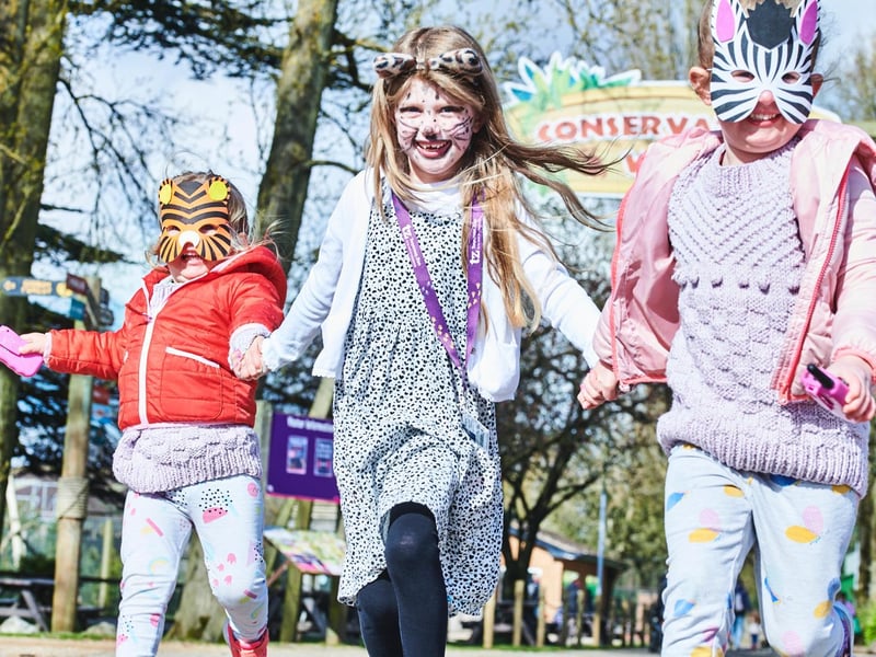 Young animal enthusiasts: Eleanor Richardson, Phillipa Plim and Matilda Richardson get ready to reunite with their favourite animals at Twycross Zoo today.