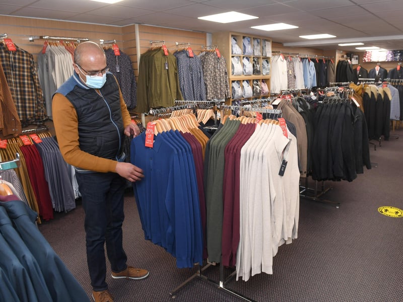 Wiseguys Menswear. Zoeb Hassanali - manager. EMN-211204-175549001