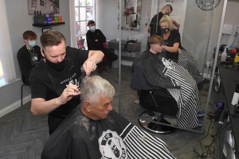 Burke & Hair, owner Richard Burke cutting Jim Davidson's hair. EMN-211204-175432001