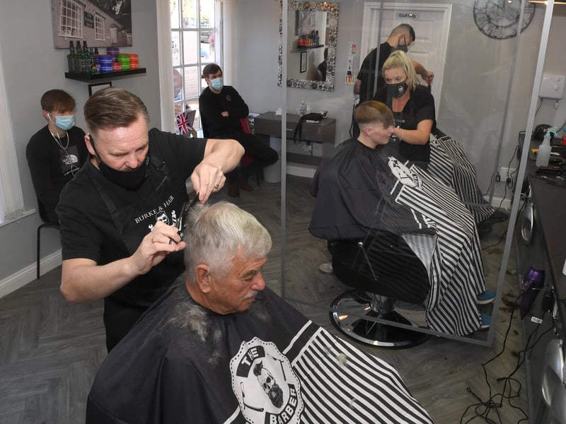 Burke & Hair, owner Richard Burke cutting Jim Davidson's hair. EMN-211204-175432001