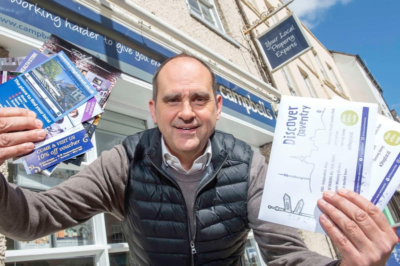 Paul Campbell, who owns Campbells Estate Agents. He is pictured with all the latest offers from Discover Daventry.
Credit: Pictures55.