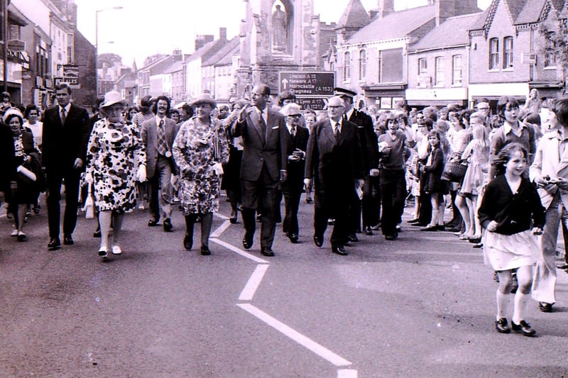 Prince Philip on his tour of Sleaford in 1975. Handley Monument in the background. EMN-211204-152345001