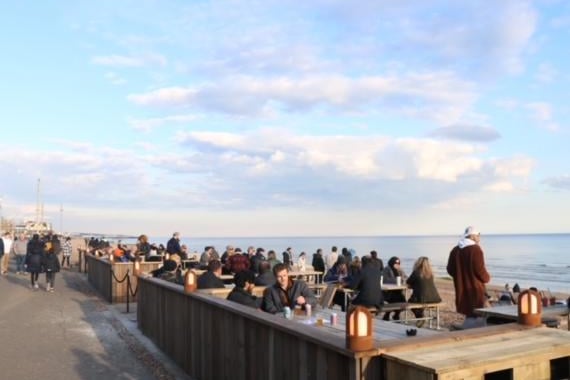 People enjoying the sea view as they meet up at Rockwater on Monday