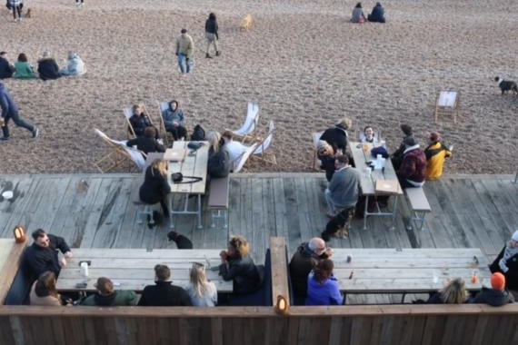 Tables on the deck and deckchairs are available for walk-in customers