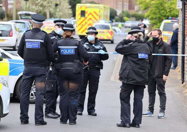 A large number of police officers have been pictured at the scene. Photo: Eddie Mitchell
