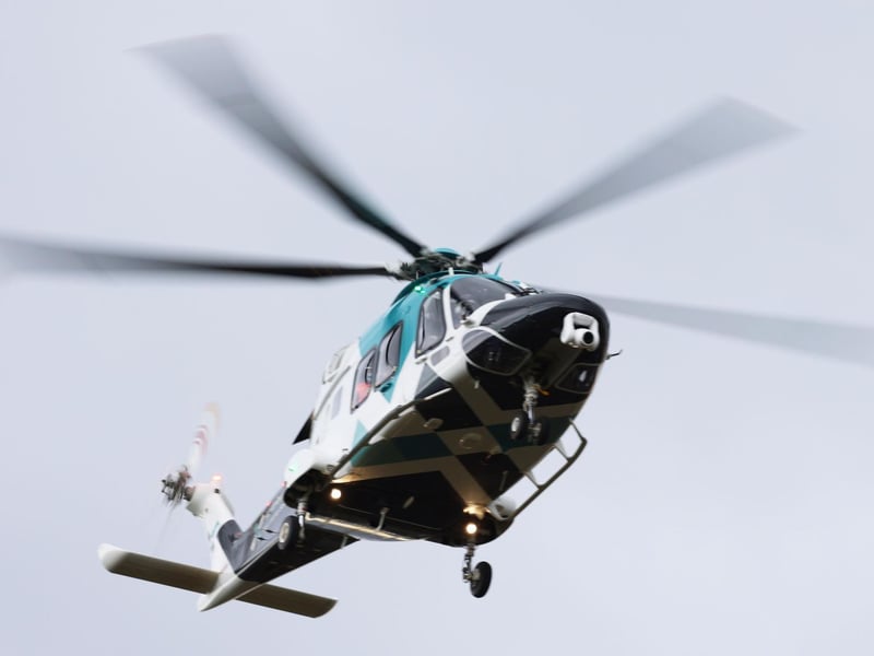 An air ambulance has landed nearby. Photo: Eddie Mitchell