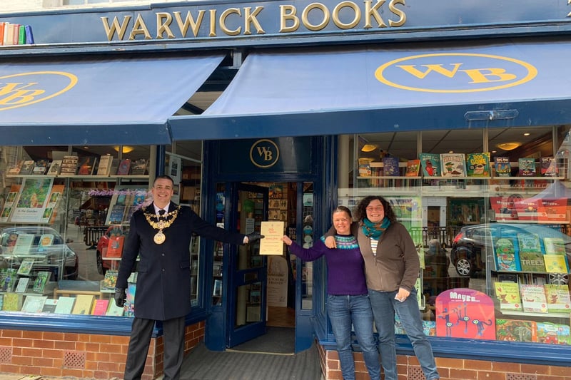 All smiles: Mayor of Warwick, Cllr Terry Morris celebrates the reopening of Warwick Books.