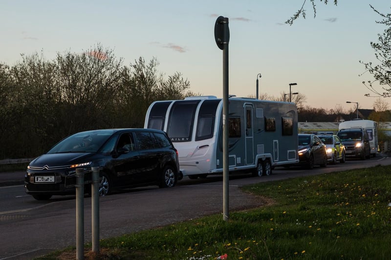 A fleet of around 30 travellers were escorted out of Ross Road by police