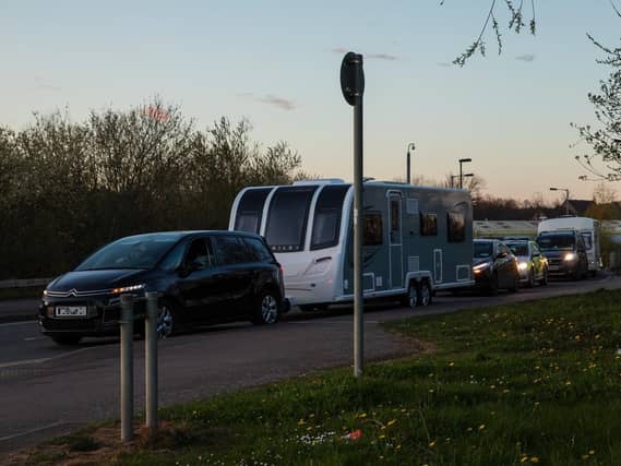A fleet of around 30 travellers were escorted out of Ross Road by police