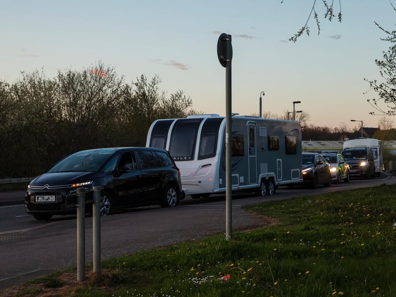A fleet of around 30 travellers were escorted out of Ross Road by police