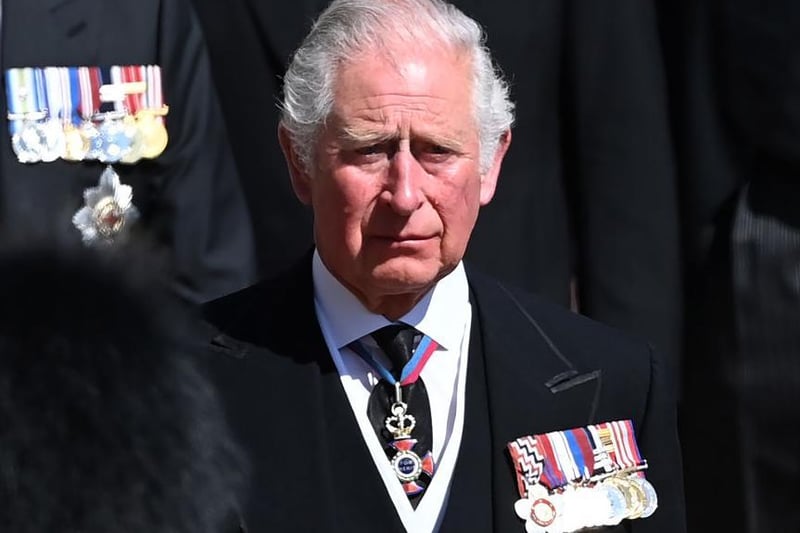 Prince Charles, Prince of Wales walks behind The Duke of Edinburgh’s coffin during the Ceremonial Procession