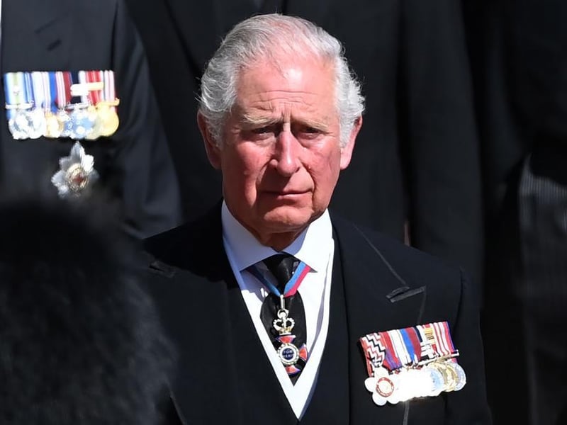 Prince Charles, Prince of Wales walks behind The Duke of Edinburgh’s coffin during the Ceremonial Procession