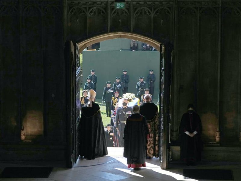 The coffin of Prince Philip, Duke of Edinburgh, is carried into his funeral service at St George's Chapel at Windsor Castle