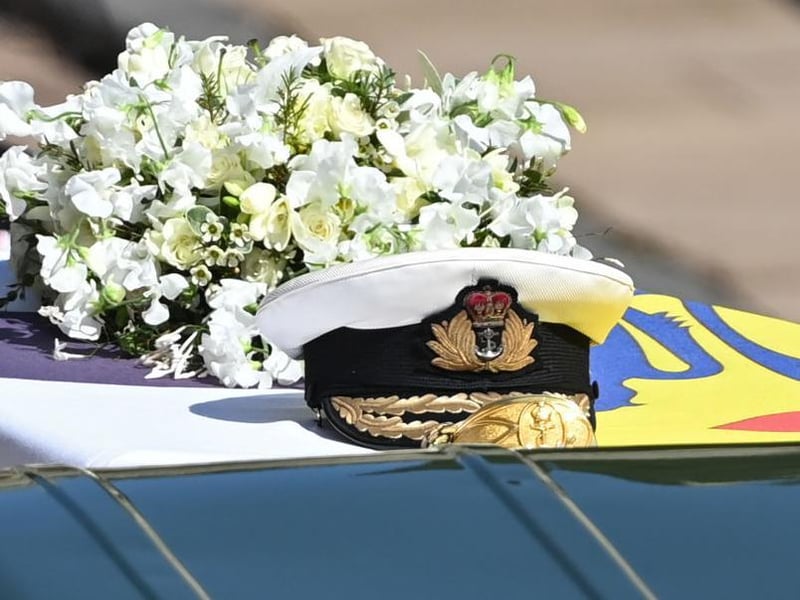 Prince Philip, Duke of Edinburgh's Royal Navy cap sits on his coffin, which covered with His Royal Highness’s Personal Standard during the Ceremonial Procession