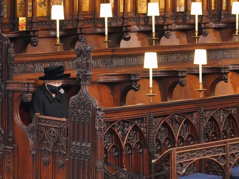 Queen Elizabeth II takes her seat at St George's Chapel