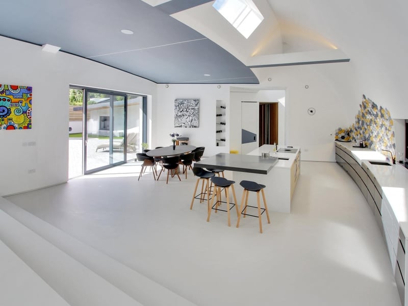 An open-plan living area includes a kitchen-diner and lounge