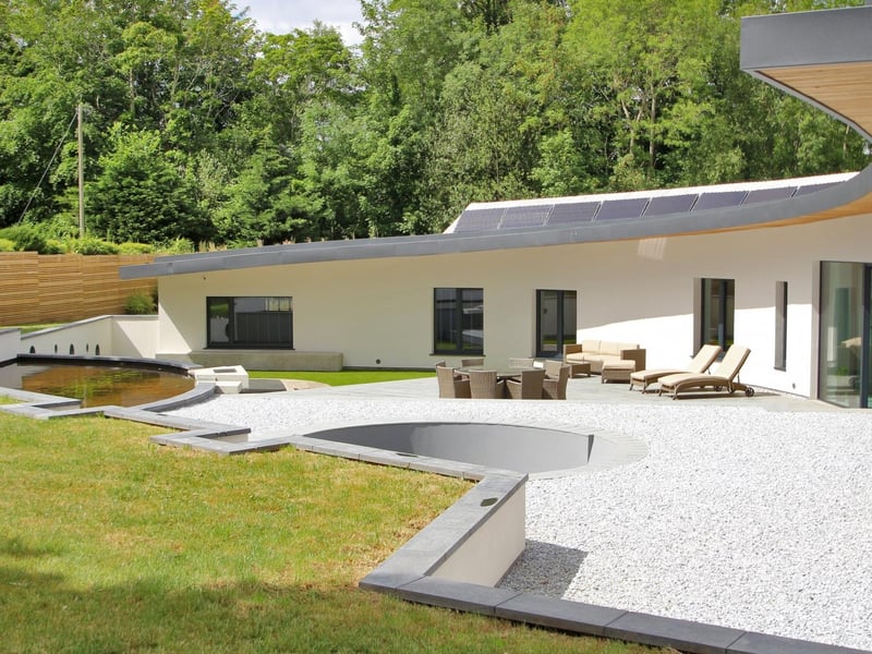 The property has 19 solar panels estimated to generate 6,200 kWh a year. It also has an air recycling system and an underloor heating system driven by a ground source heat pump
