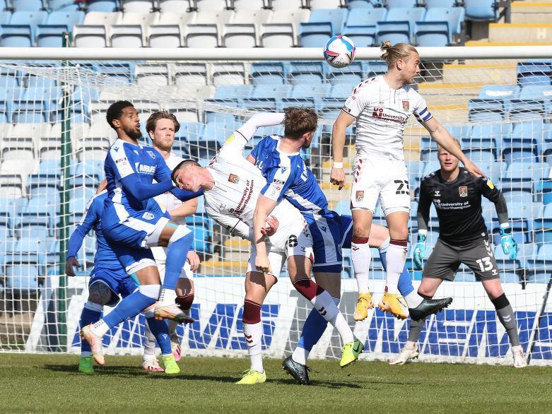 Cobblers' defenders knew they had been in a battle against Gillingham on Saturday. Pictures: Pete Norton.