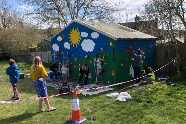 Friends of Miswell Park wanted to brighten up the park by creatinga colourful mural the old disused changing room block