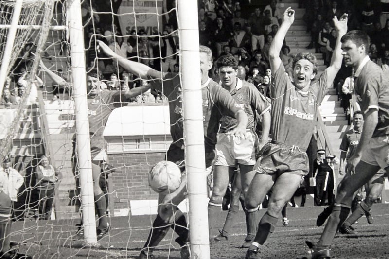 Posh were muddling along in mid-table in Division Four (they'd been relegated from Division Three in the 1978-79 season) when legendary boss Chris Turner was appointed first-team manager in January, 1991. He inspired a surge up the table which culminated in promotion on the final day of the 1990-91 season . Posh clinched fourth place (there were no play-offs that season) by coming from 2-0 down to draw 2-2 at Chesterfield. Defenders Dave Robinson and George Berry scored the goals. Kevin Bremner is pictured celebrating the decisive goal.