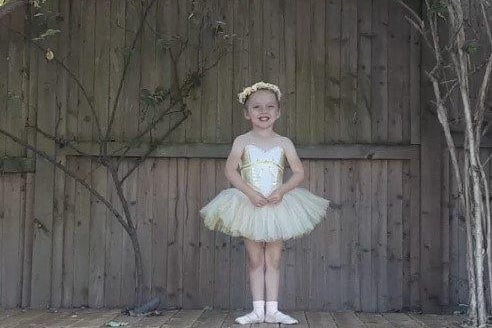 Tilly Levett, five, performs her ballet solo in the garden