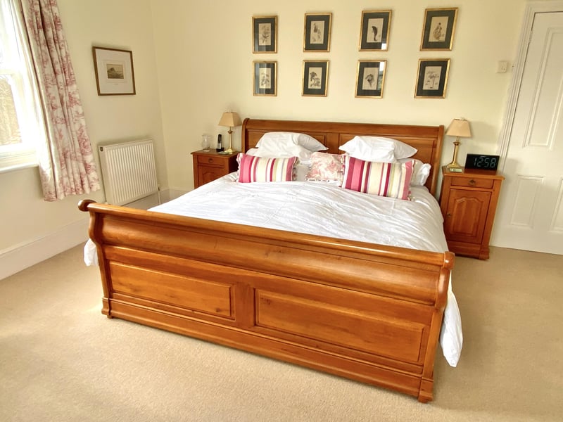 One of the property's seven bedrooms. The main bedroom has sea views, a built-in wardrobe and access to an en-suite bathroom