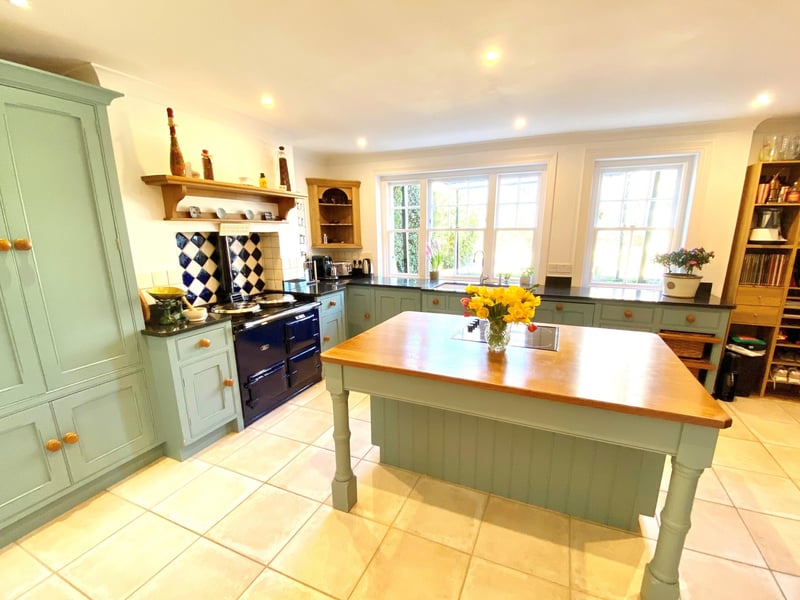 A central island unit and AGA feature in the kitchen-breakfast room. The house also has a wine cellar