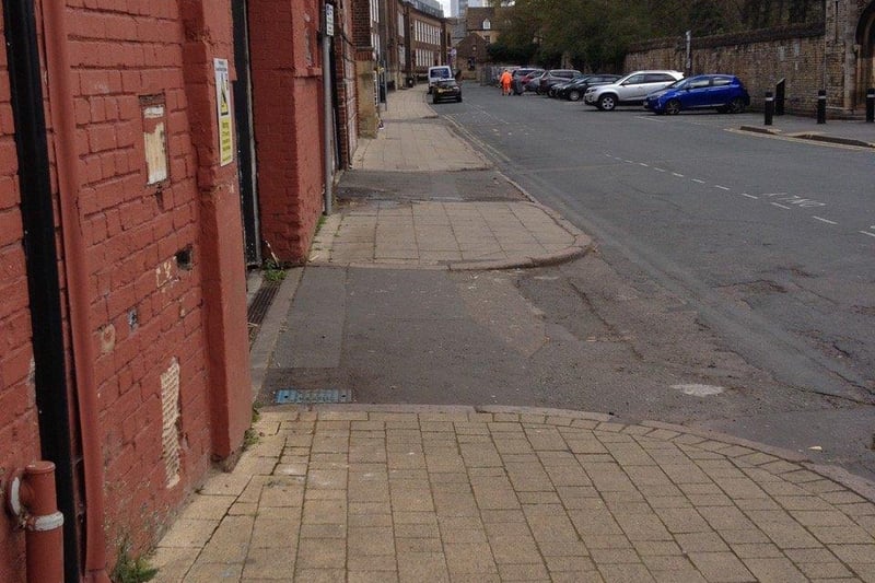 The quality of the pavement on St Peter's Road, at the back of the Town Hall, has been questioned