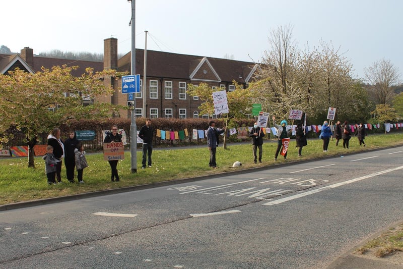 People lining the road during the first day of strike action called over academy plans for Moulsecoomb Primary School