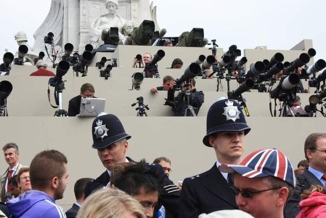 Yvonne added: "My favourite image from the day is of the pictures of the press and broadcasting stand behind us. 
"It really shows how the world was watching, and still observes the Royal family keenly - there's so many comedic characters in it too - from the police men and the man in the Union Jack cap."
Photo: Yvonne McKeown