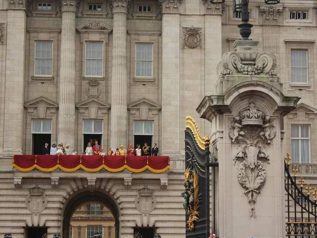 The Royal Family looking out onto the crowds at the private reception. Photo: Yvonne McKeown