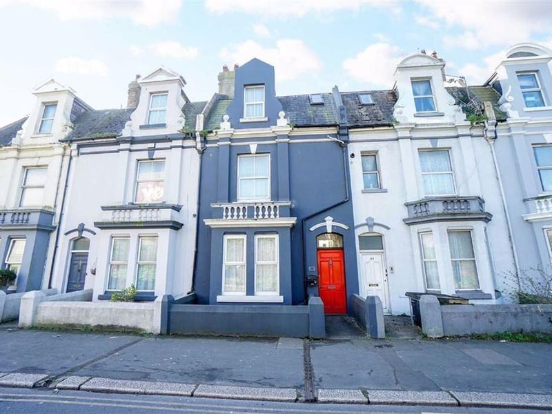 A four bed terraced house. Price: £300,000.